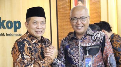 Menteri Koperasi, DR Ferry Juliantono SE AK MSI dan Ketua Umum PWI Pusat, Akhmad Munir