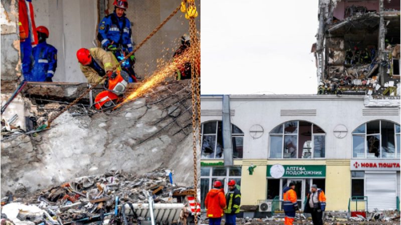 _Petugas darurat Ukraina bekerja di tengah reruntuhan setelah serangan udara Rusia menghantam Kyiv