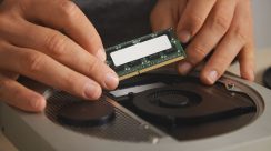 close-view-professional-hands-removing-memory-plate-upgrade-small-personal-computer