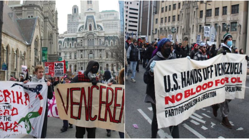 Massa demonstran berpawai dari Balai Kota Philadelphia ke Pusat Pertahanan militer AS di Spring Garden Street sambil membawa poster memprotes serangan militer Amerika Serikat di Venezuela.